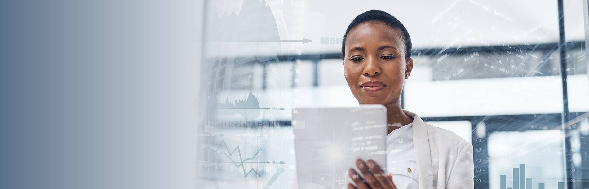 woman looking at tablet computer with futuristic background