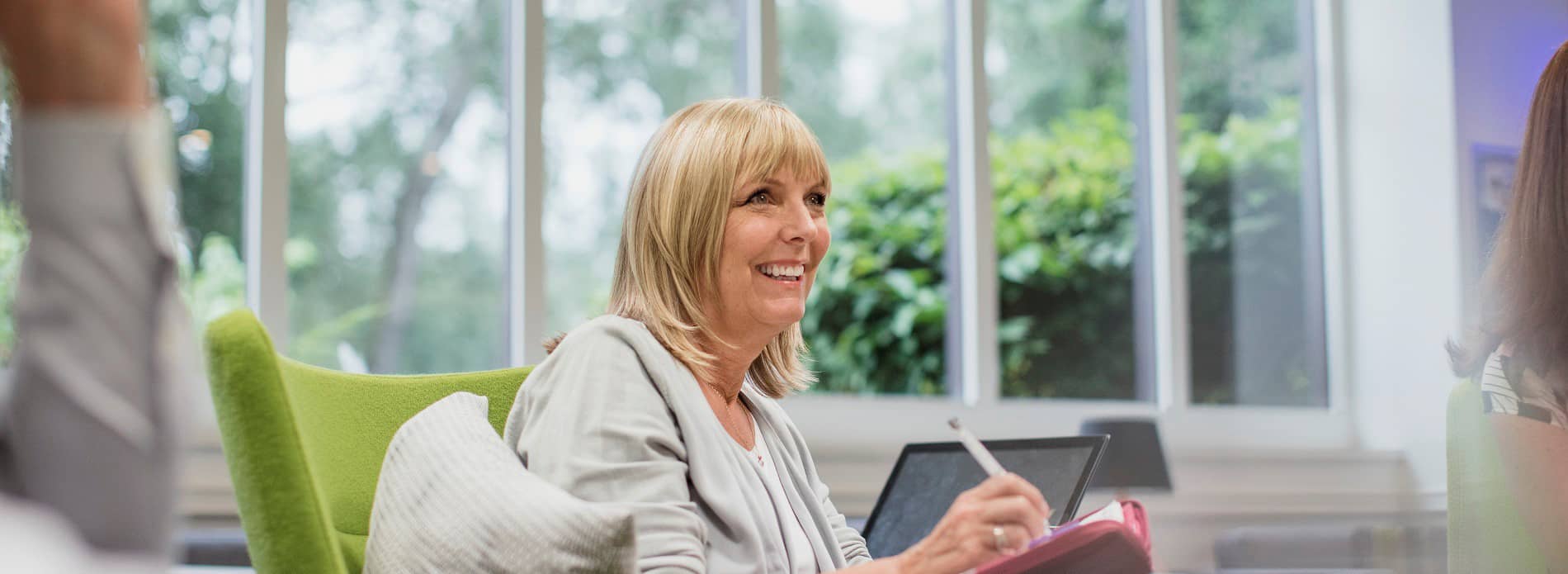 woman smiling in meeting