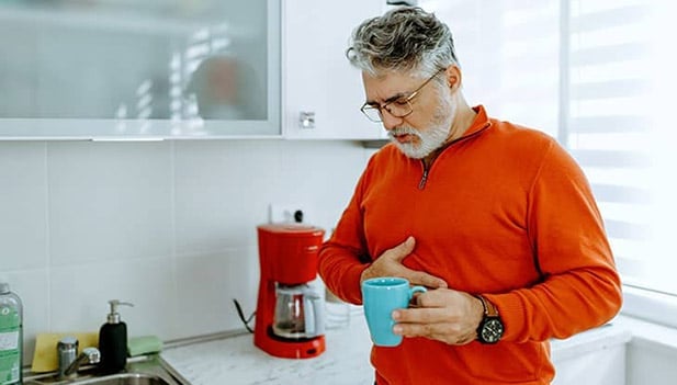 Man suffering from digestive pain