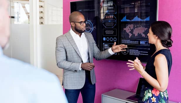 man giving in person presentation