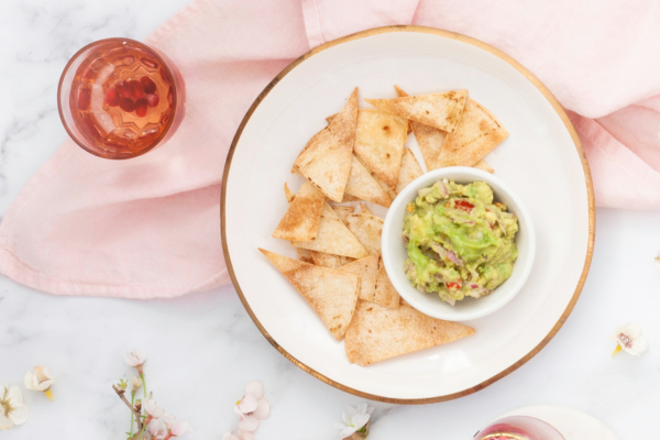 Homemade tortilla chips with guacamole for copy.png