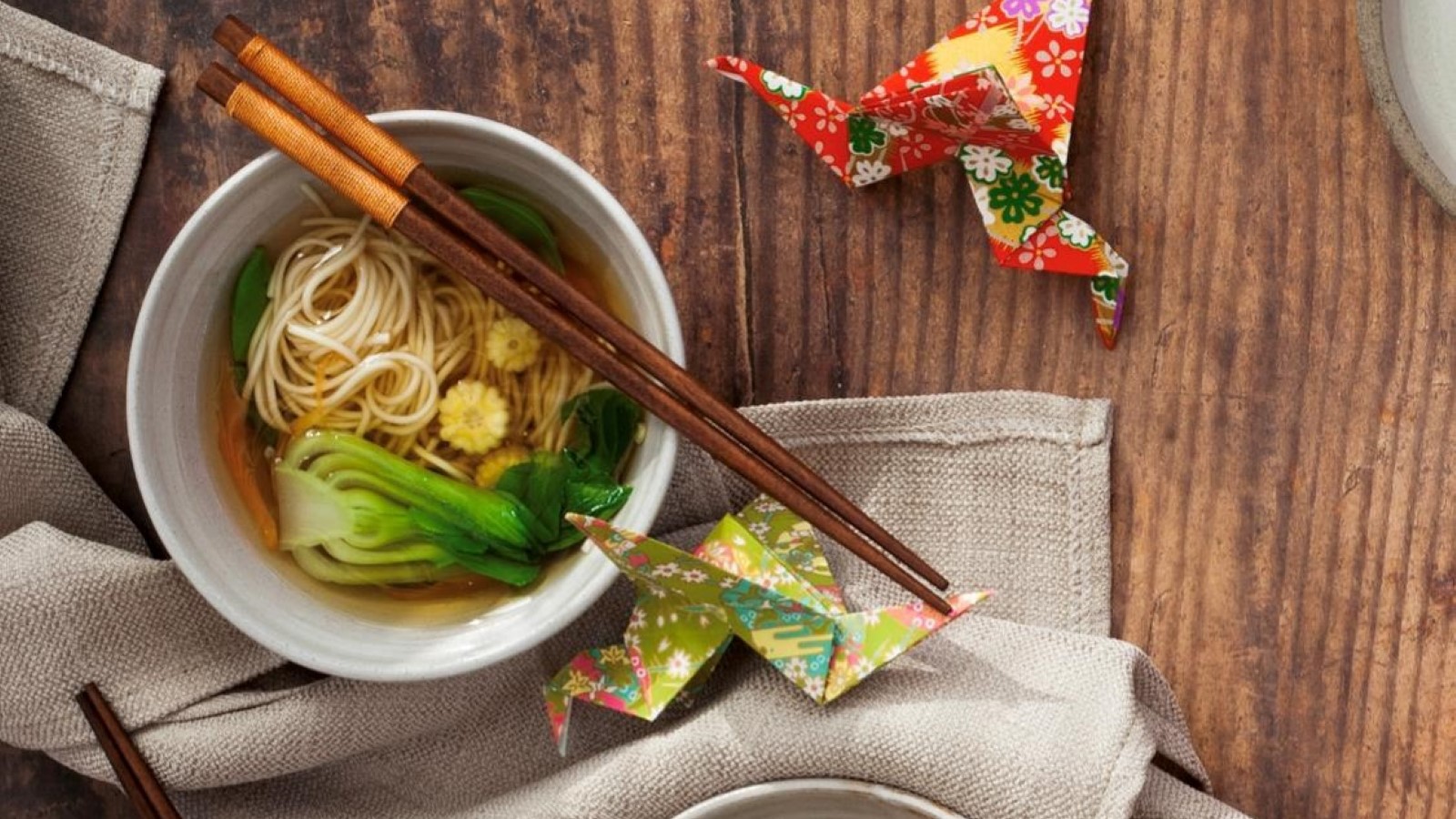 Ramen noodle dish on Japanese themed background