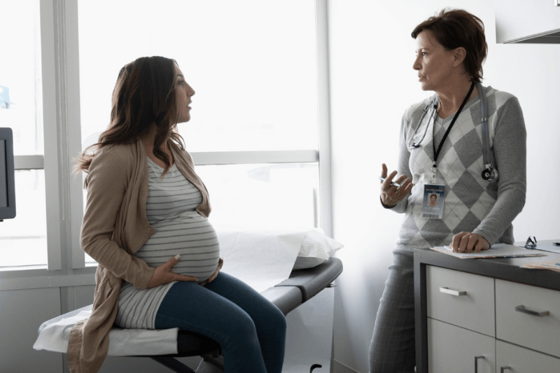 pregnant woman at doctor's appointment