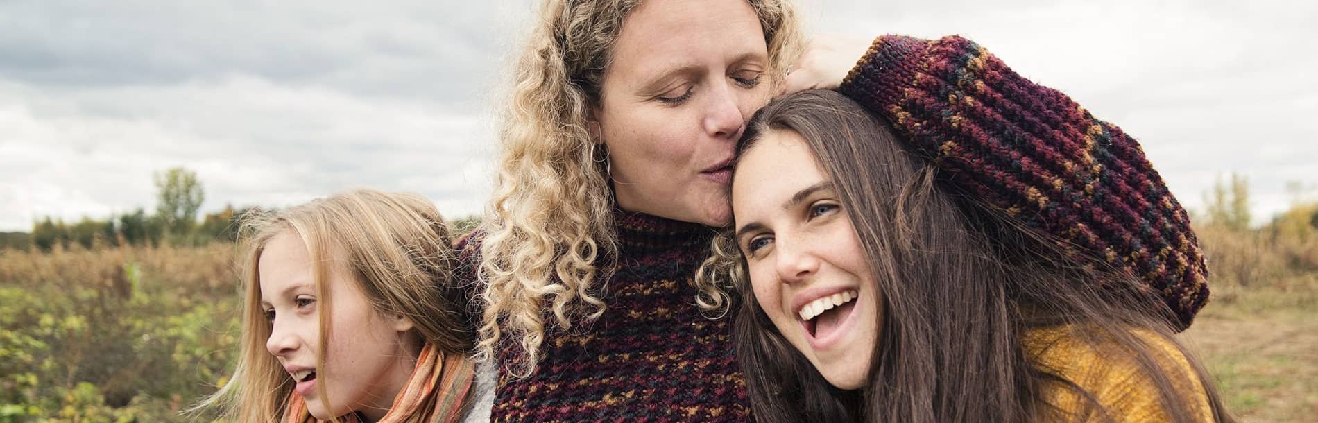 Woman with her 2 teenage children 